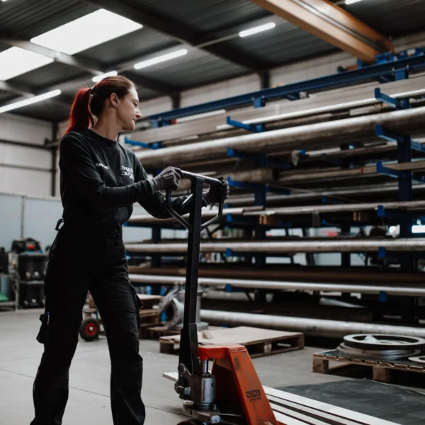 Katie moving materials through the Titan workshop as part of her daily work